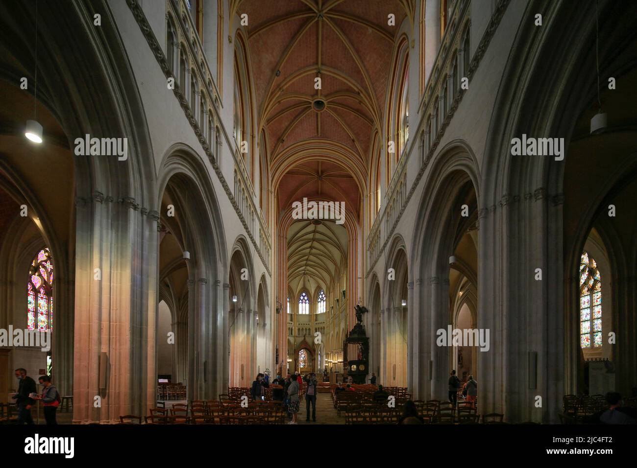 View from the west portal through the nave to the choir, axis bend in the main axis, Gothic cathedral Saint-Corentin, old town of Quimper, department Stock Photo