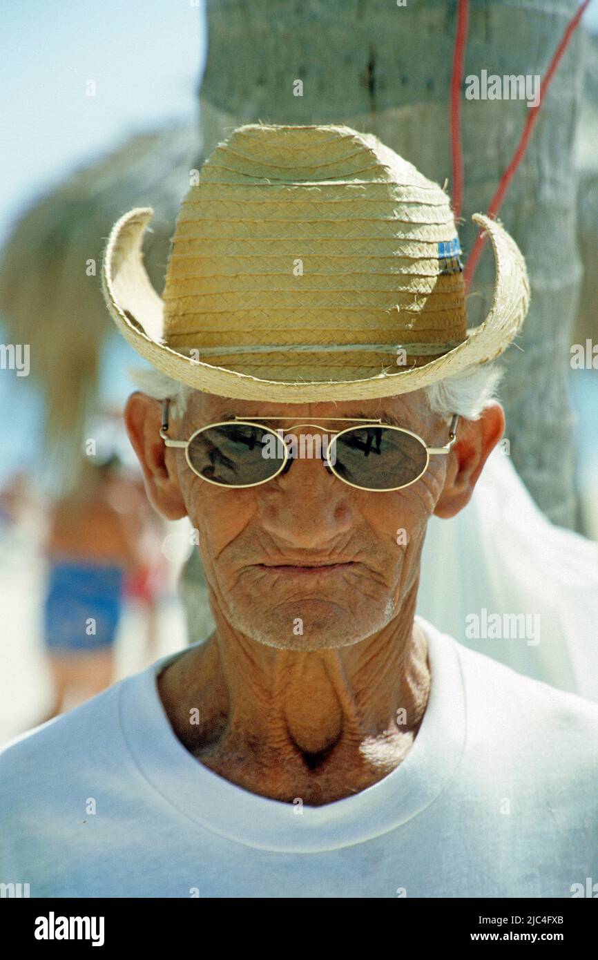 Elderly cuban with strawhat and sunglass, portrait, Pinar del Rio, Cuba, Caribbean Stock Photo