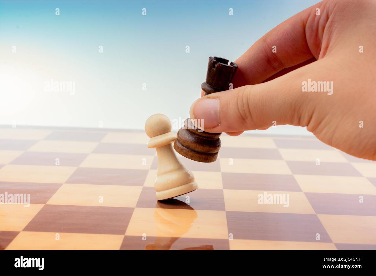 Making A Move Chess Person playing chess game making a move on board Stock Photo - Alamy