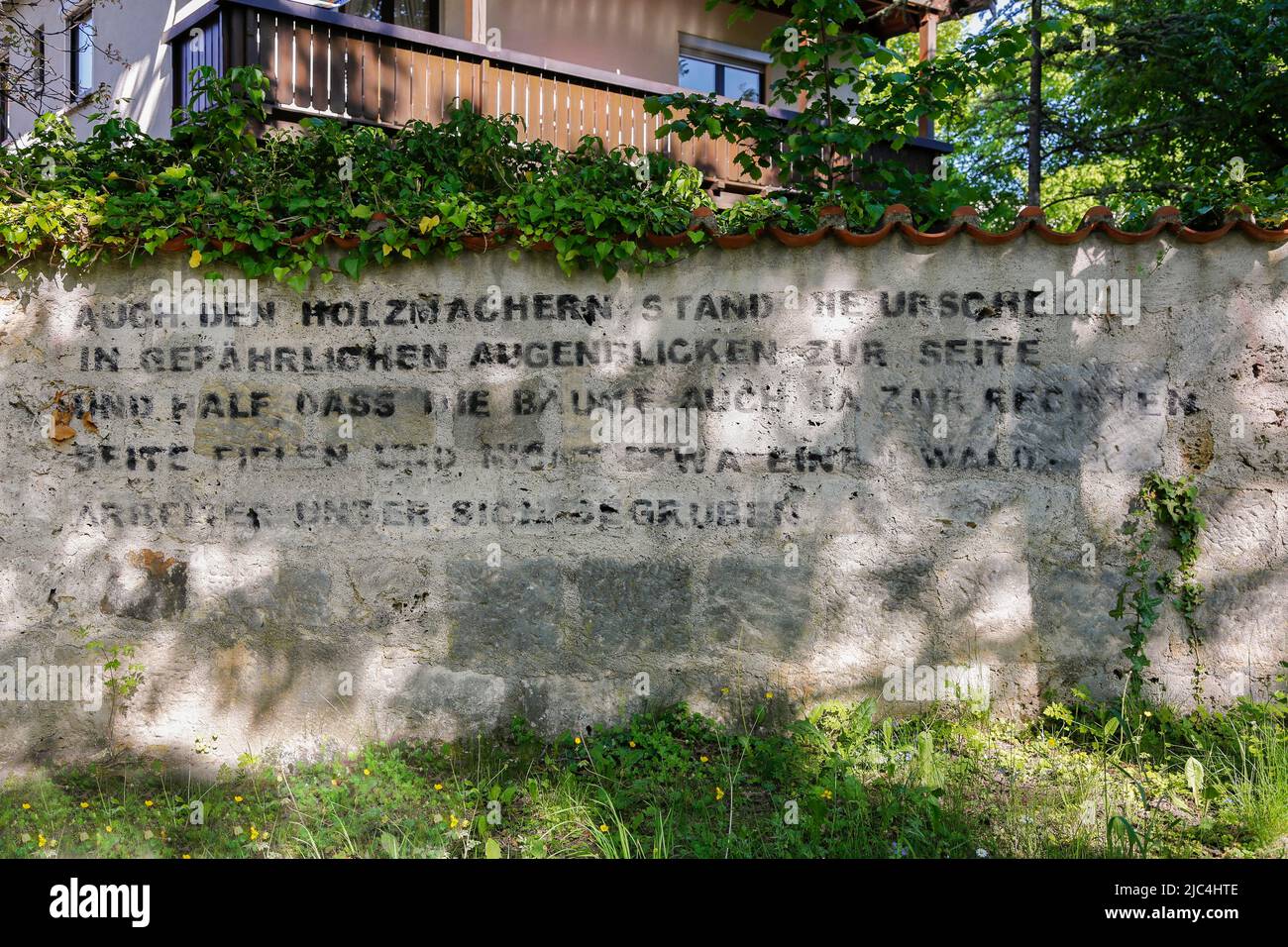 Legendary Pfullingen, writing on wall, legend of the Urschel, letters weathered, poorly legible writing, Pfullingen, Baden-Wuerttemberg, Germany Stock Photo