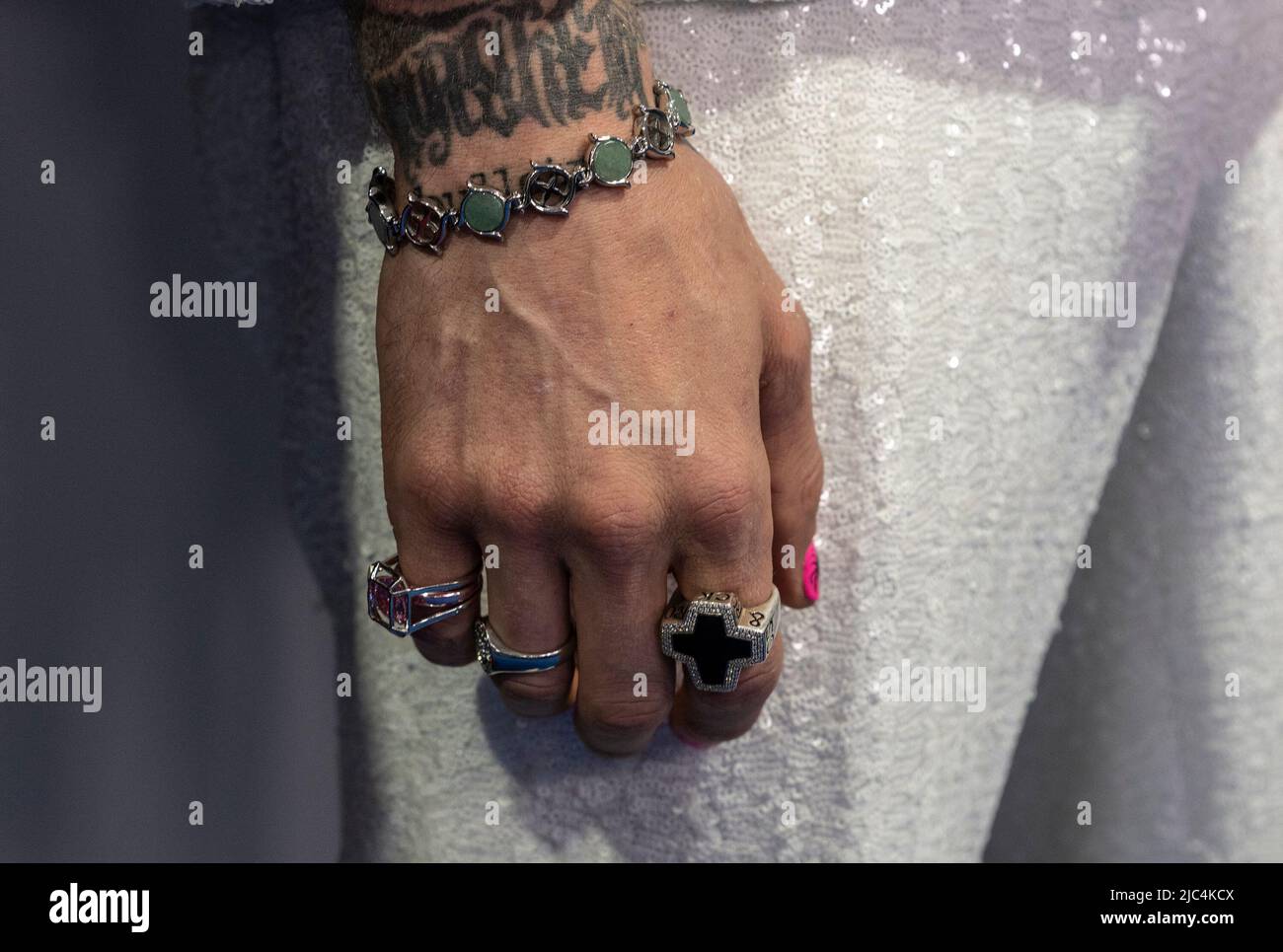 June 9 2022 New York New York United States Colson Baker aka Machine Gun Kelly jewelry details attends North America premiere of film Taurus during Tribeca Film Festival at Beacon Theater Credit