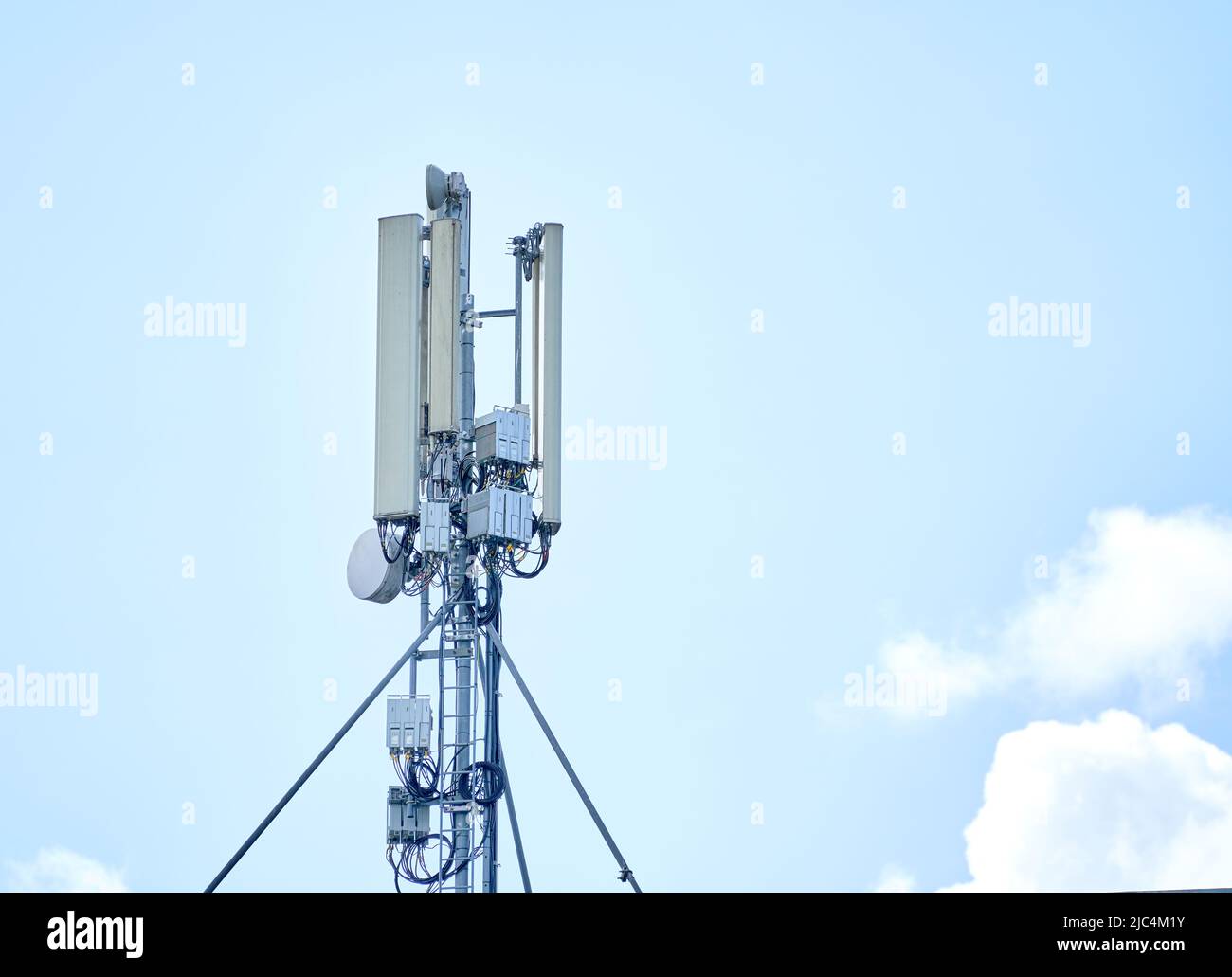 Premium Photo  Antenna cellular 4g, 5g against the blue sky, close-up