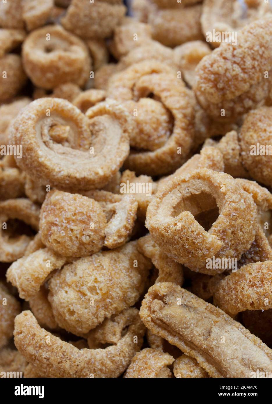 Iberian Torreznos, spanish pork rinds. Displayed at street market stall Stock Photo Alamy