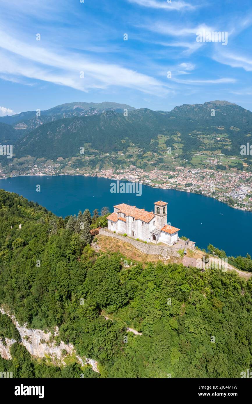 Aerial view of the Santuario della Madonna della Ceriola on top of Montisola, Iseo lake. Siviano, Montisola, Brescia province, Lombardy, Italy, Europe. Stock Photo