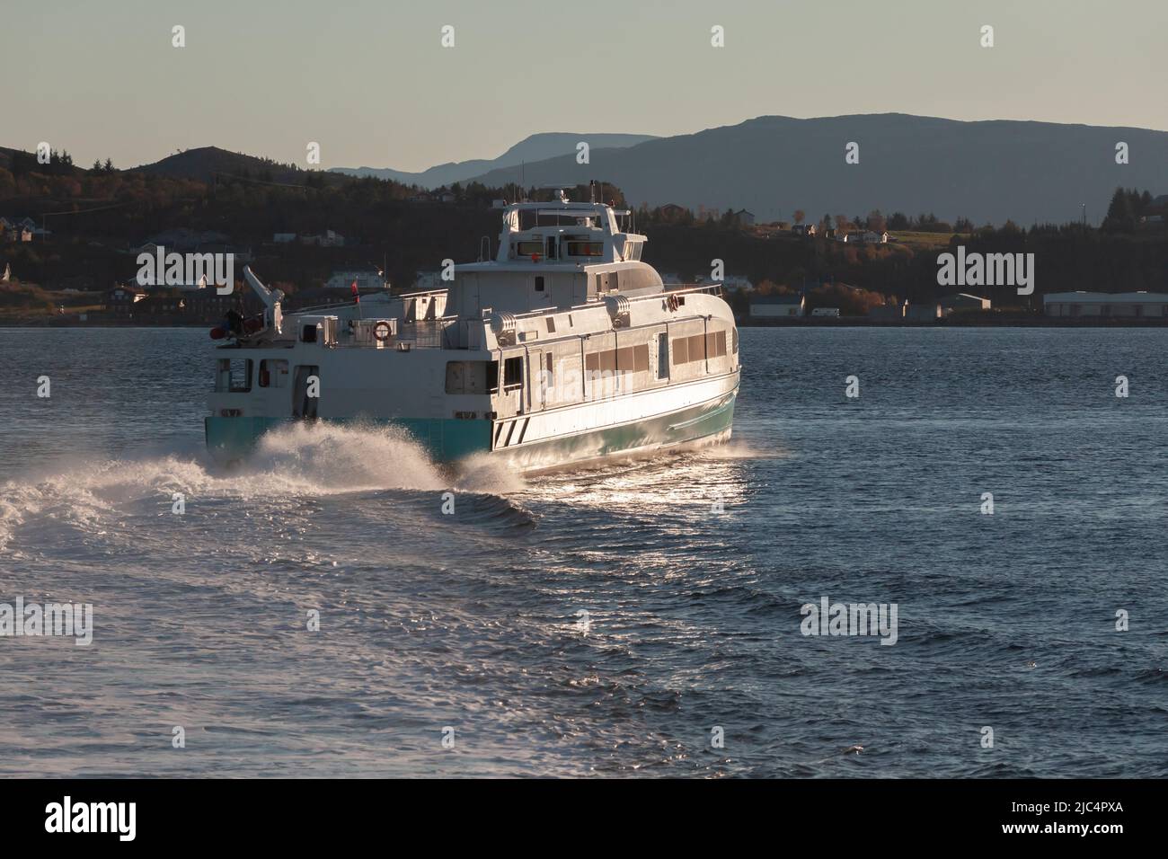 Fast passenger ferry sails the Trondheimsleia strait, Norway Stock Photo