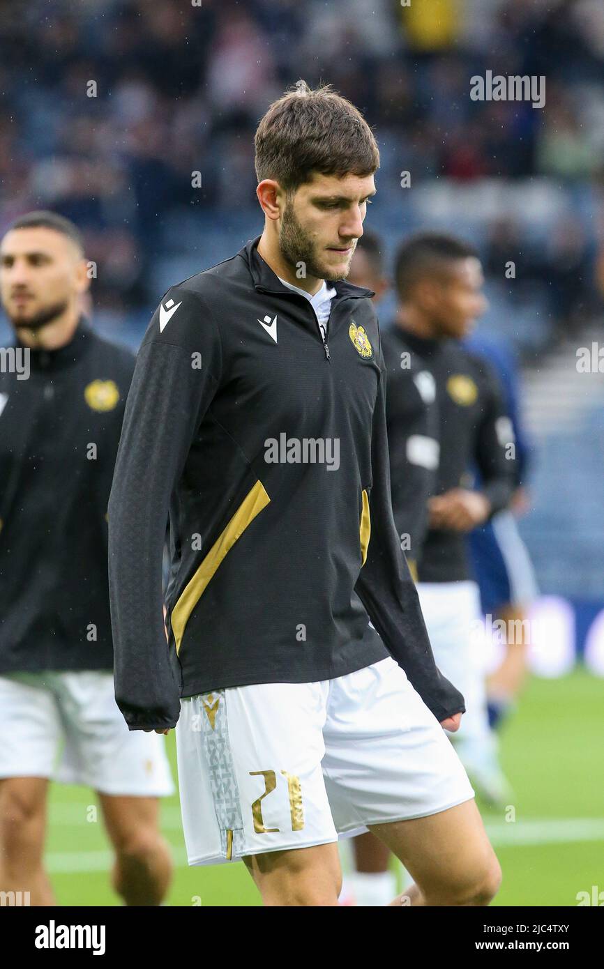 Styopa Mkrtchyan, professional football player, playing for the official Armenian football team, warming up and training at Hampden Park, Glasgow, Stock Photo