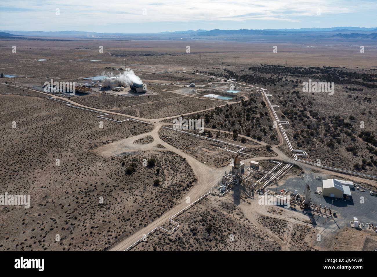 A geothermal production well and the Blundell Geothermal Power Plant