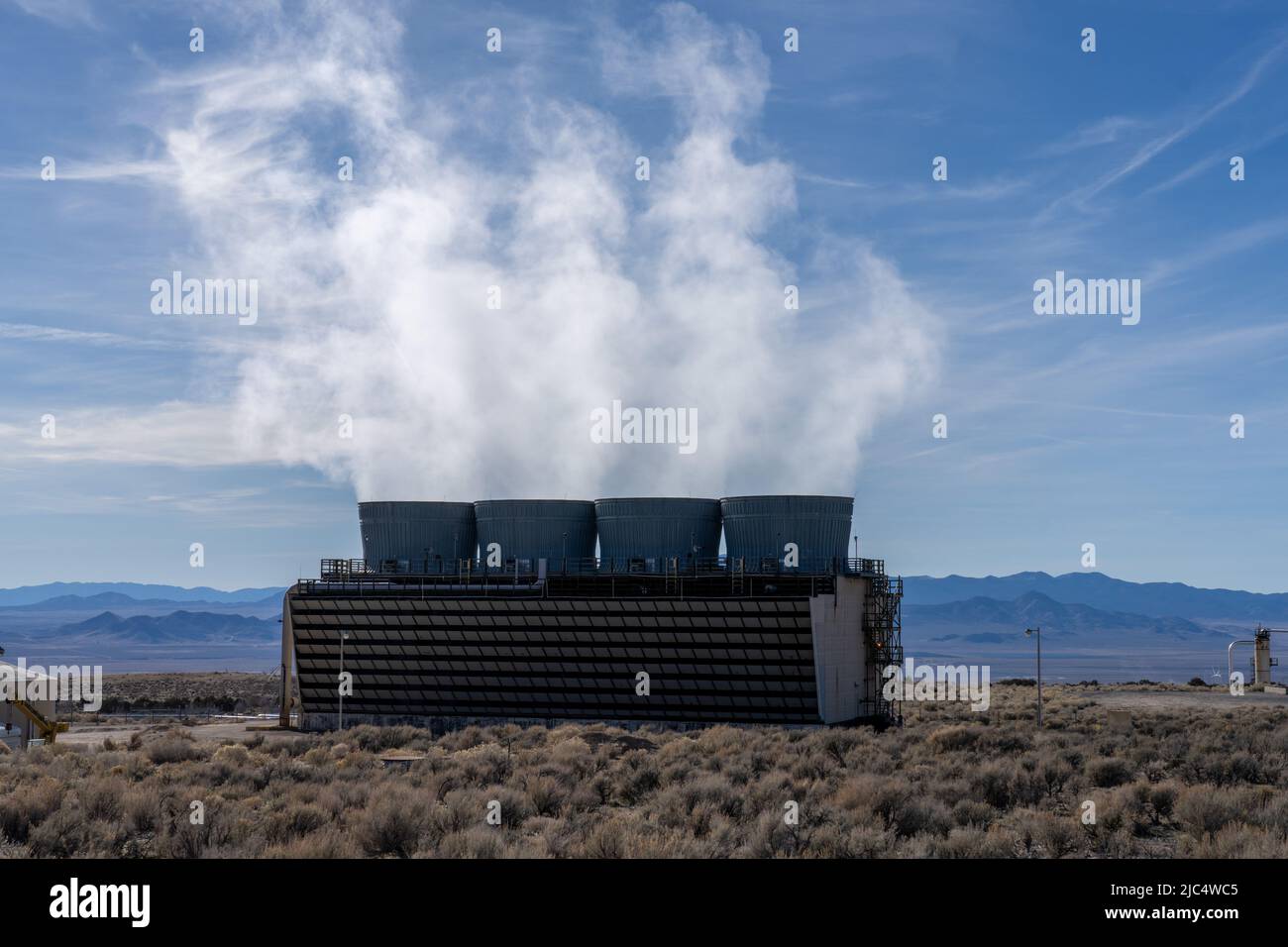 Steam rising from cooling towers of the single-flash unit at the ...