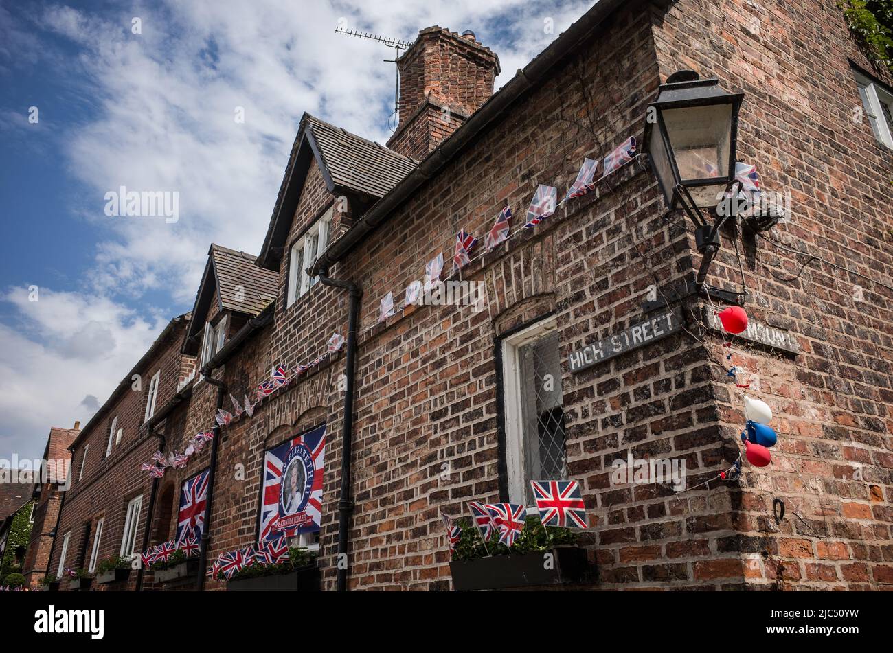 Decorations in the village of Great Budworth, Cheshire during the platinum jubilee. Stock Photo