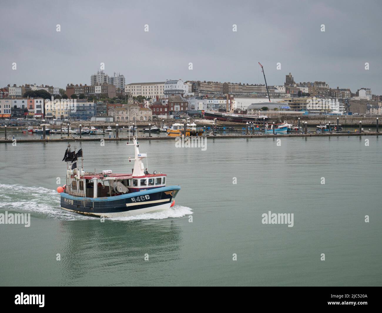 Fishing boat leaving Ramsgate harbour Stock Photo Alamy