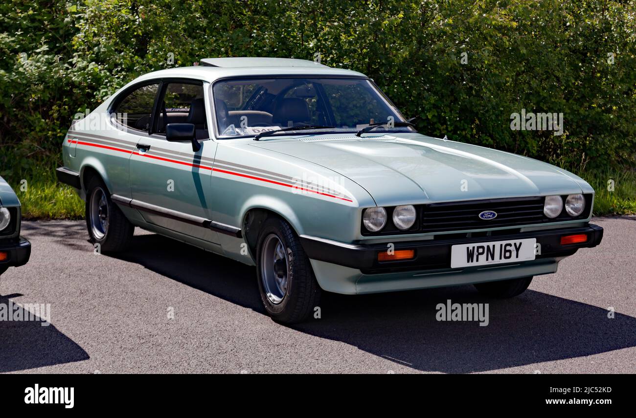 Three-quarter Front View of a Green, 1982, Ford Capri MkIII, on display at the Deal Classic Car Show 2022 Stock Photo