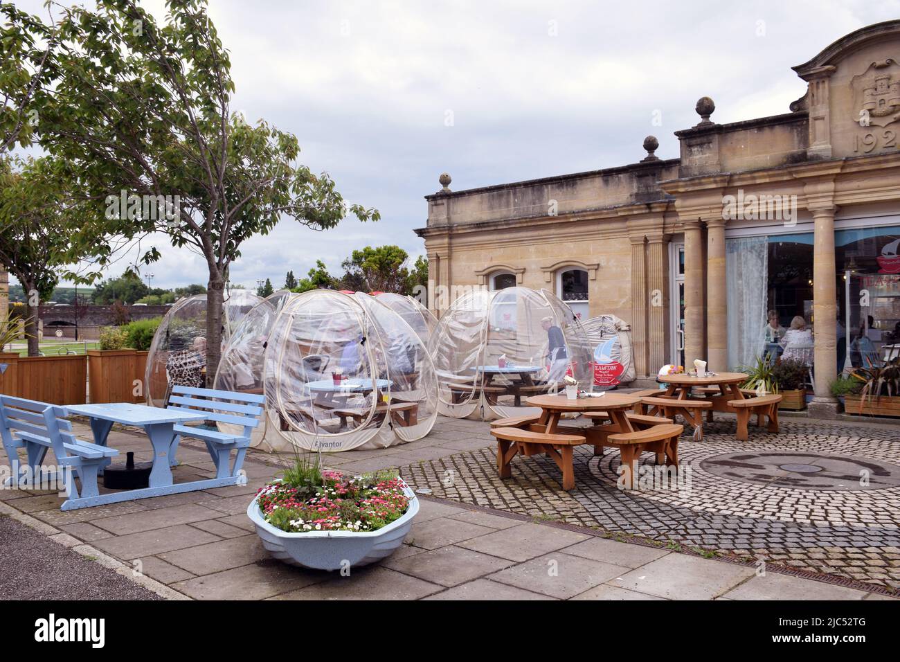 Covid safe dining pods at cafe in Barnstaple, Devon, UK May 2022 Stock