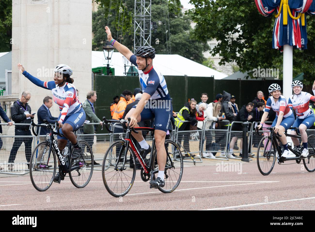5th June 2022 - Sir Chris Hoy and Kadeena Cox ride along the Mall in London during Queen Elizabeth's Platinum Jubilee Pageant Stock Photo