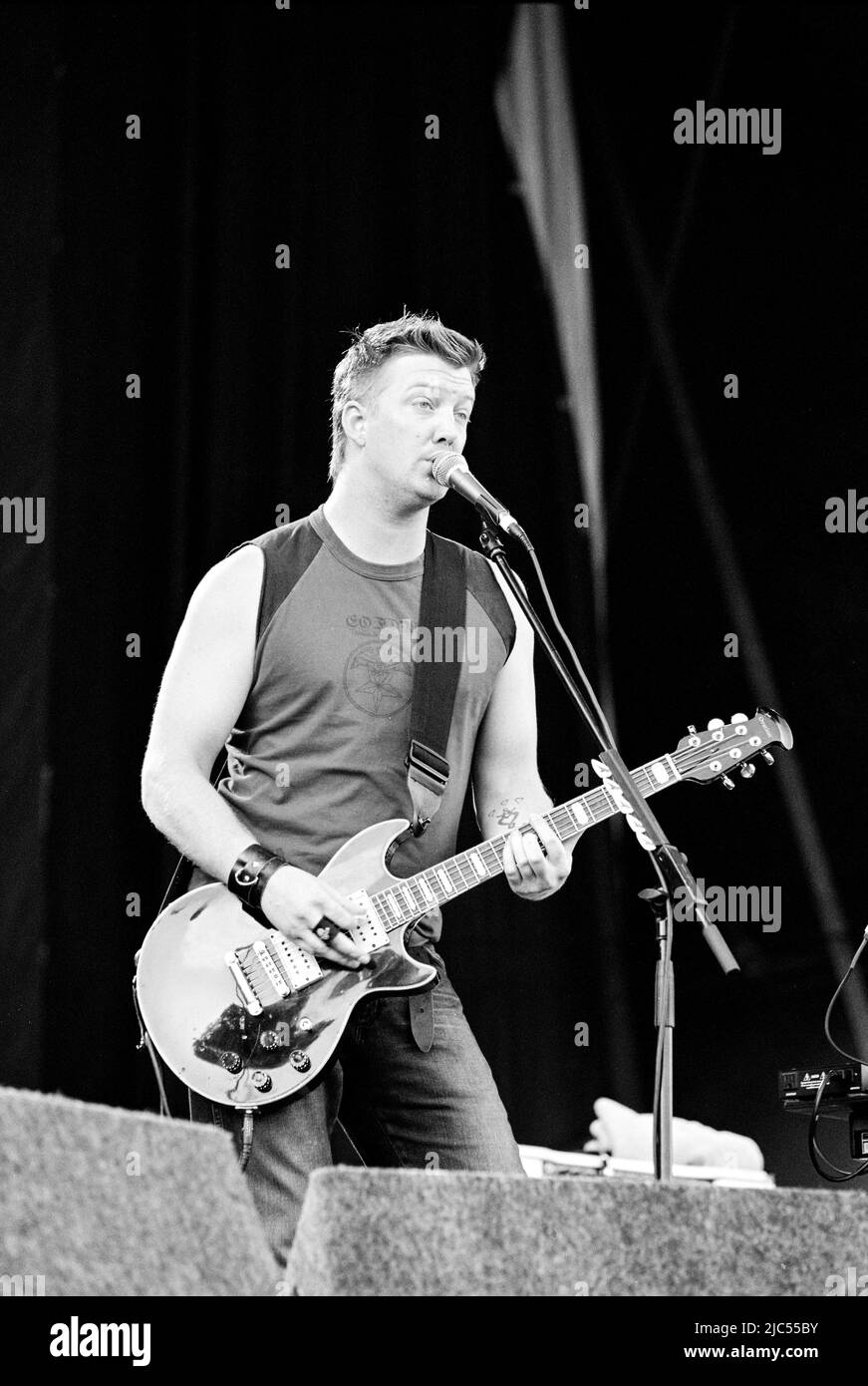 Queens of the Stone Age performing at the Virgin V Festival V2003, Hylands Park, Chelmsford, Essex, United Kingdom. Stock Photo
