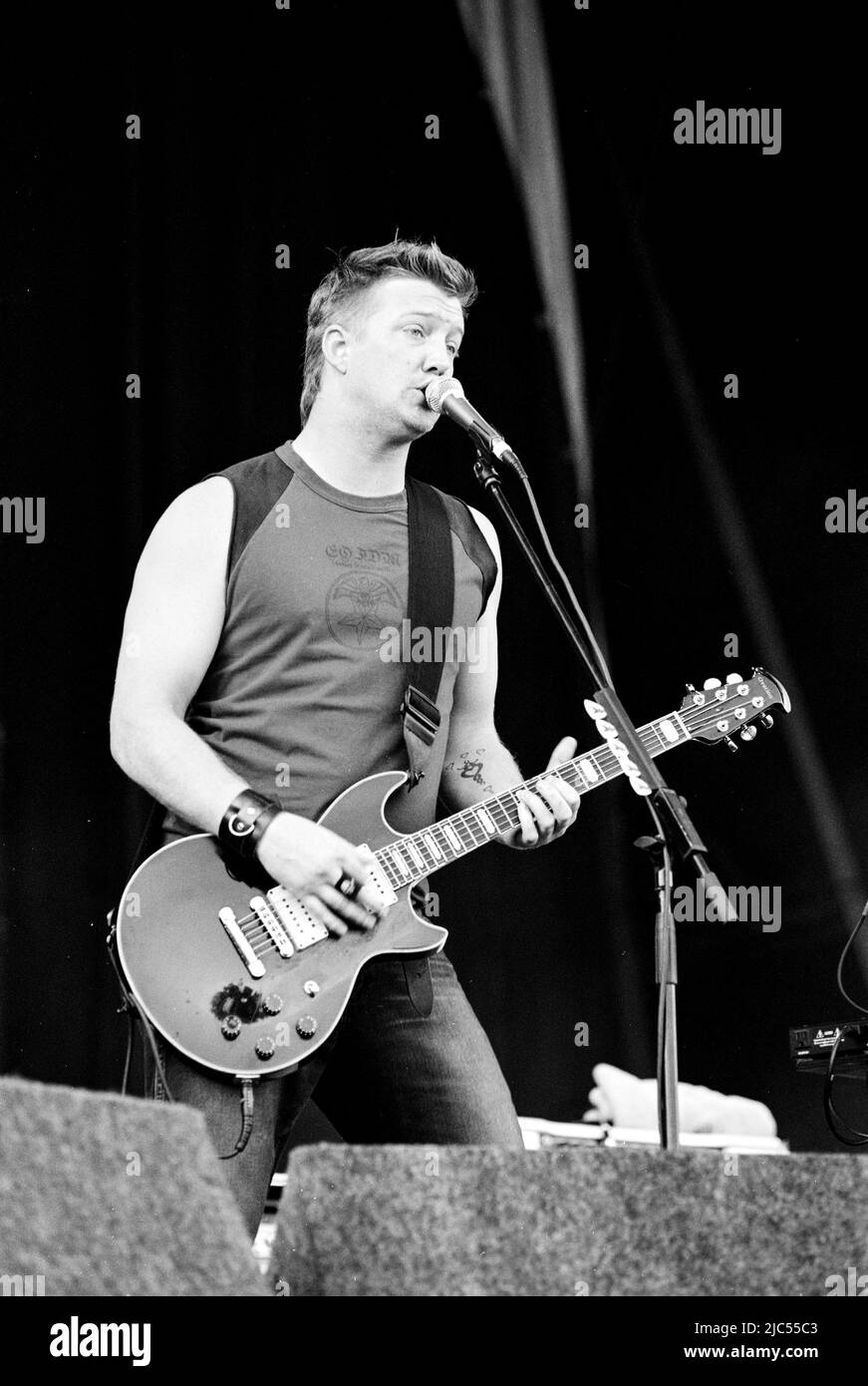 Queens of the Stone Age performing at the Virgin V Festival V2003, Hylands Park, Chelmsford, Essex, United Kingdom. Stock Photo