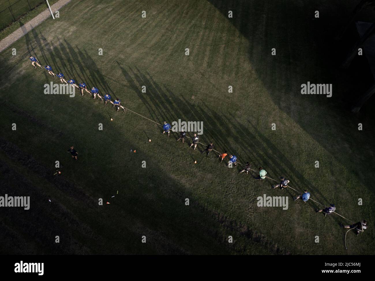 Retie, Belgium. 09th June, 2022. Aerial drone picture shows a training session of the Belgian national tug of war team, on Thursday 09 June 2022 in Retie. The team will compete in the World Games this summer. BELGA PHOTO ERIC LALMAND Credit: Belga News Agency/Alamy Live News Stock Photo