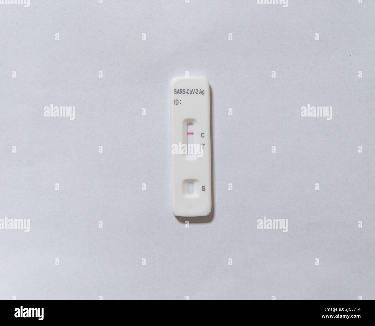 RTPCR home testing kit cassette with negative test result indication on a white background