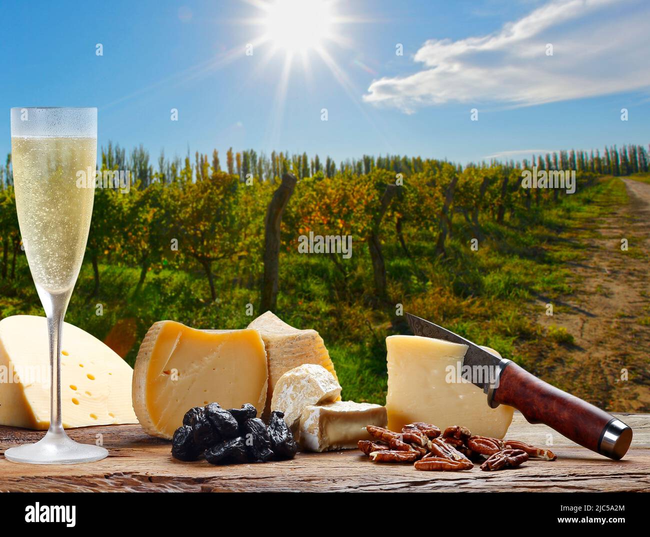 champagne with delicious cheeses Stock Photo Alamy