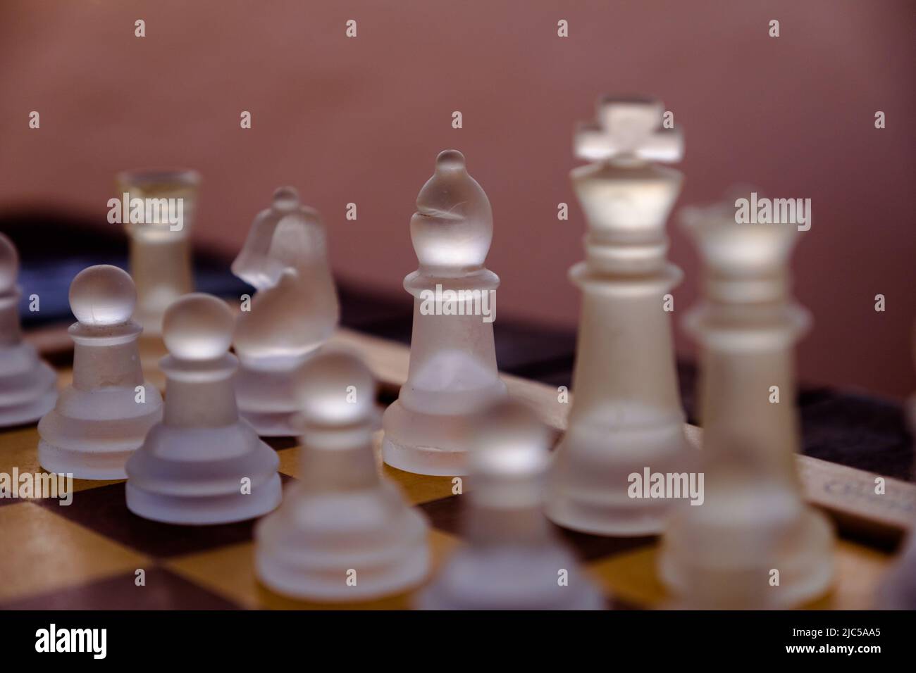 A transparent glass chess set Stock Photo