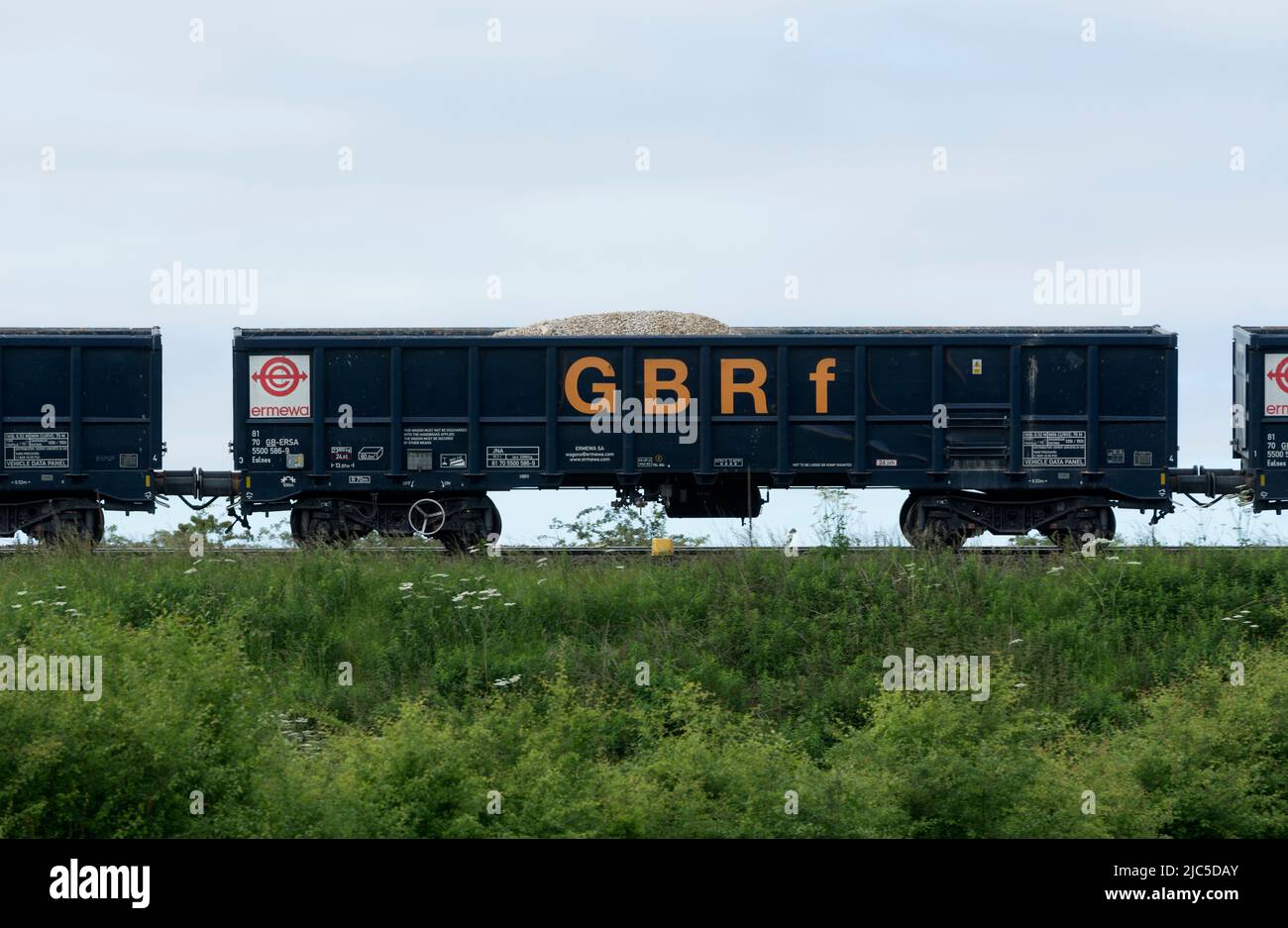 GBRf Ermewa truck, part of a ballast carrying train, Warwickshire, UK Stock Photo
