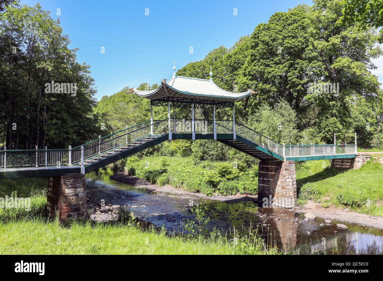 The Chinese Bridge, designed by Weir Schultz in 1899 to be constructed over the Lugar river on the Dumfries Estate, near Cumnock. Scotland, UK Stock Photo
