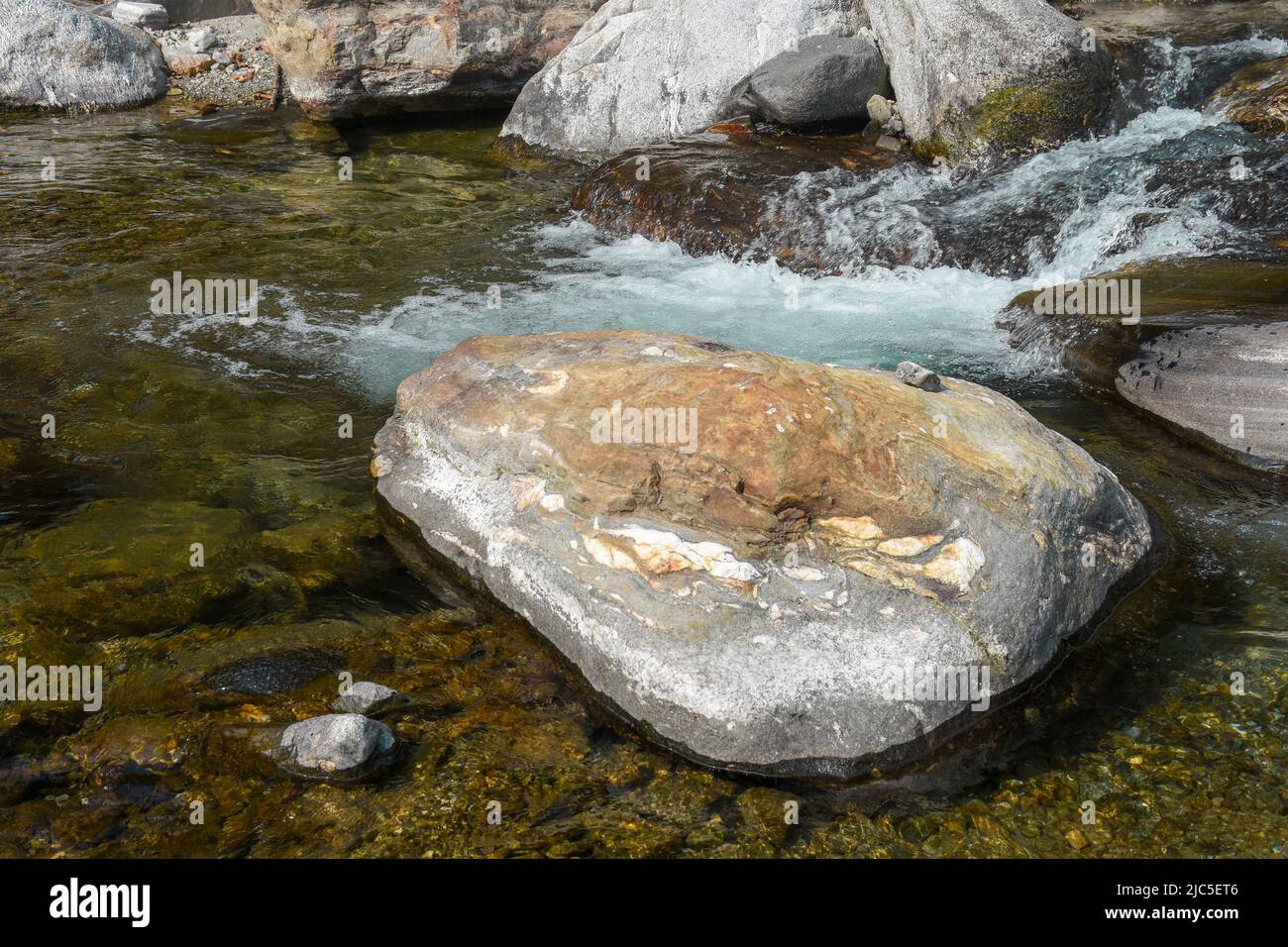 Himalayan mountain river, amazing landscape of nature. Pure clear water moves among large stones Stock Photo