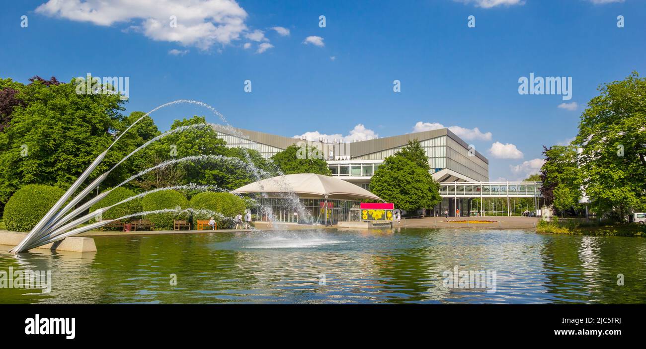 Panorama of the fountain in the lake of the Gruga park in Essen, Germany Stock Photo