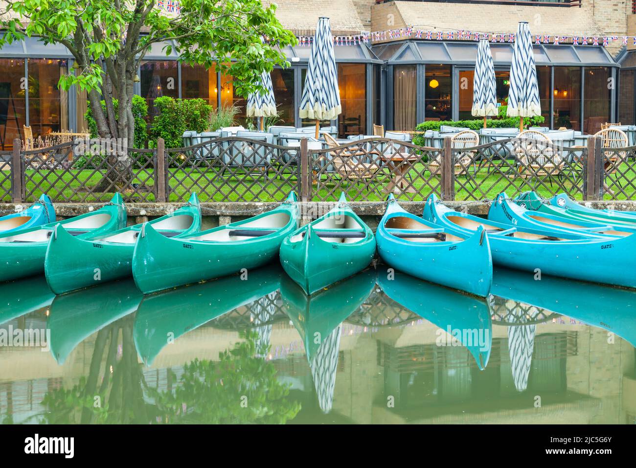 Canoes moored on river Cam in Cambridge. Stock Photo