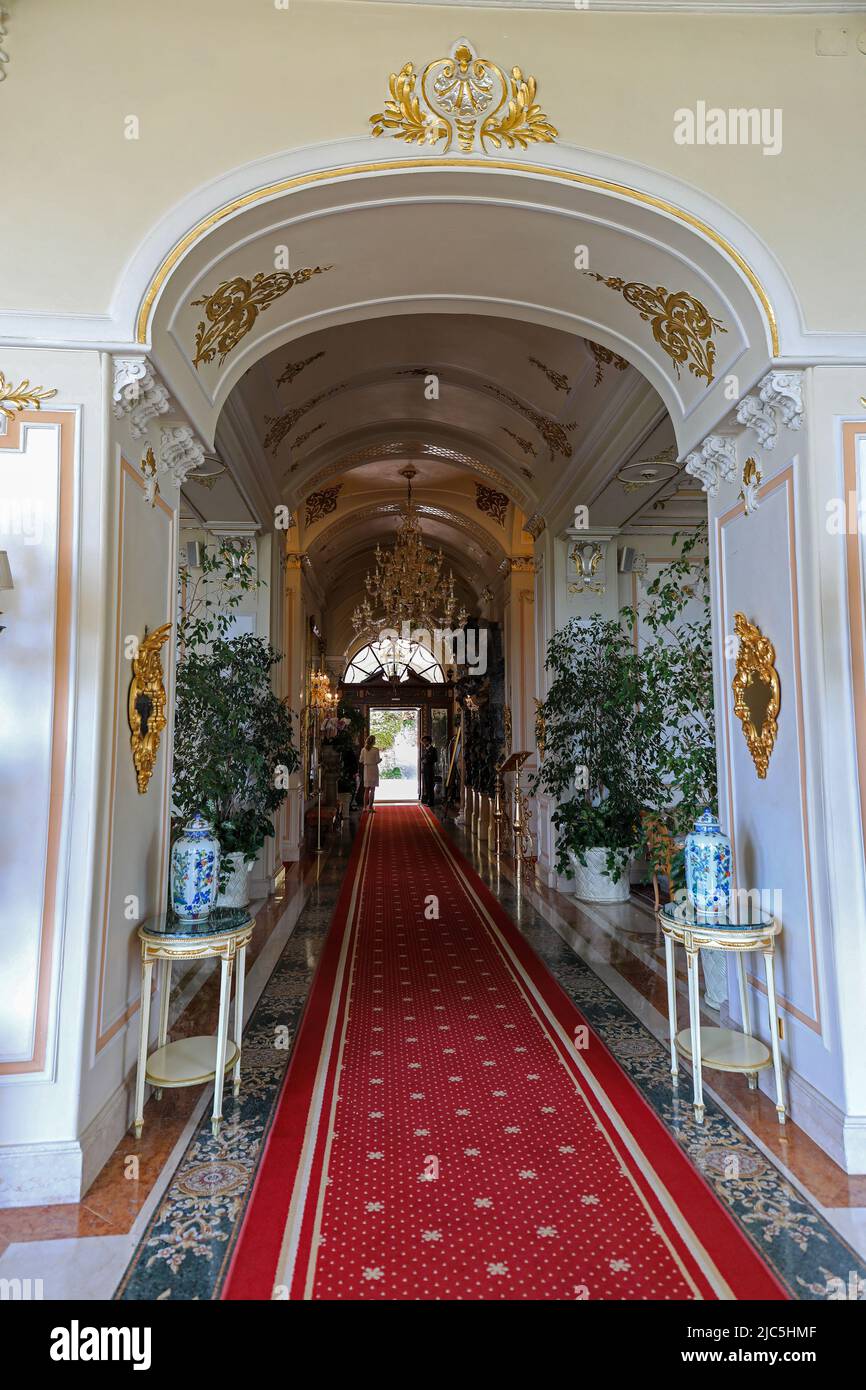 An ornate corridor inside the Grand Hotel des Iles Borromees, Stresa, Lake Maggiore, Italy Stock Photo