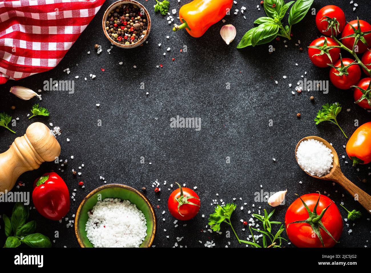Food cooking background on black stone table Stock Photo Alamy