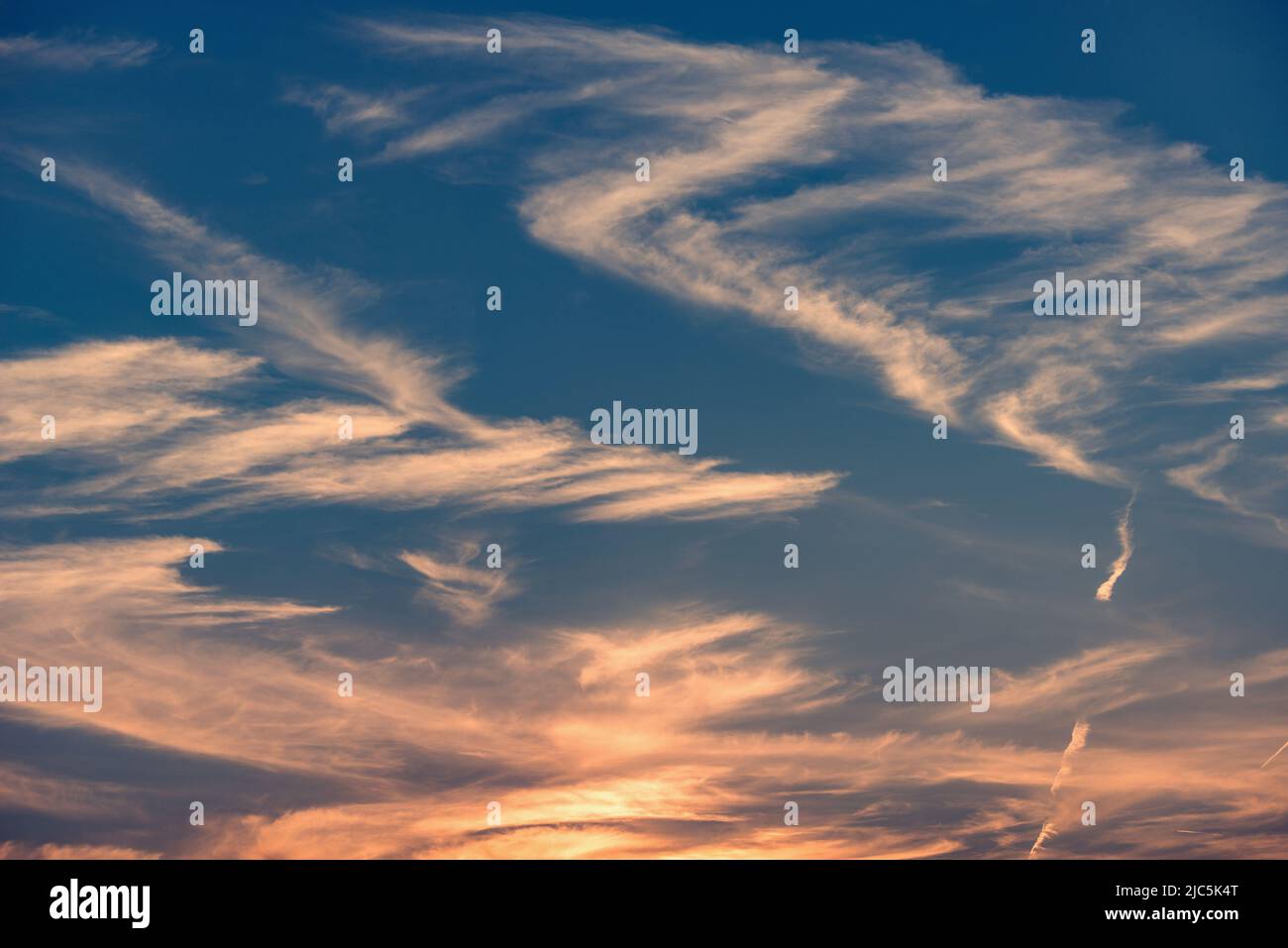 Amazing cloudscape on the sky at sunset time after rain Stock Photo - Alamy
