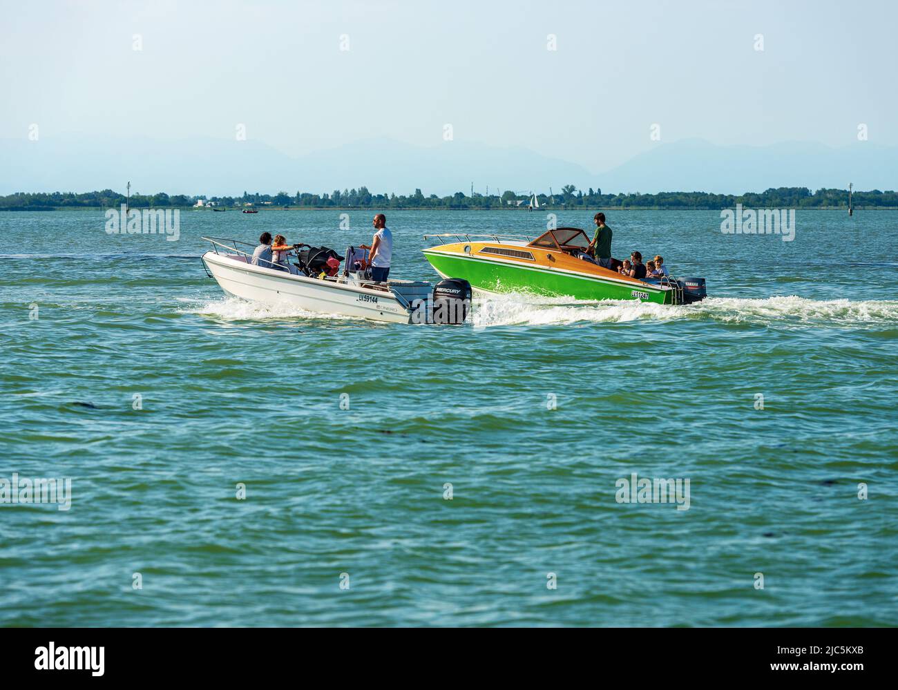 Venice canal motor boat family hi-res stock photography and images - Alamy