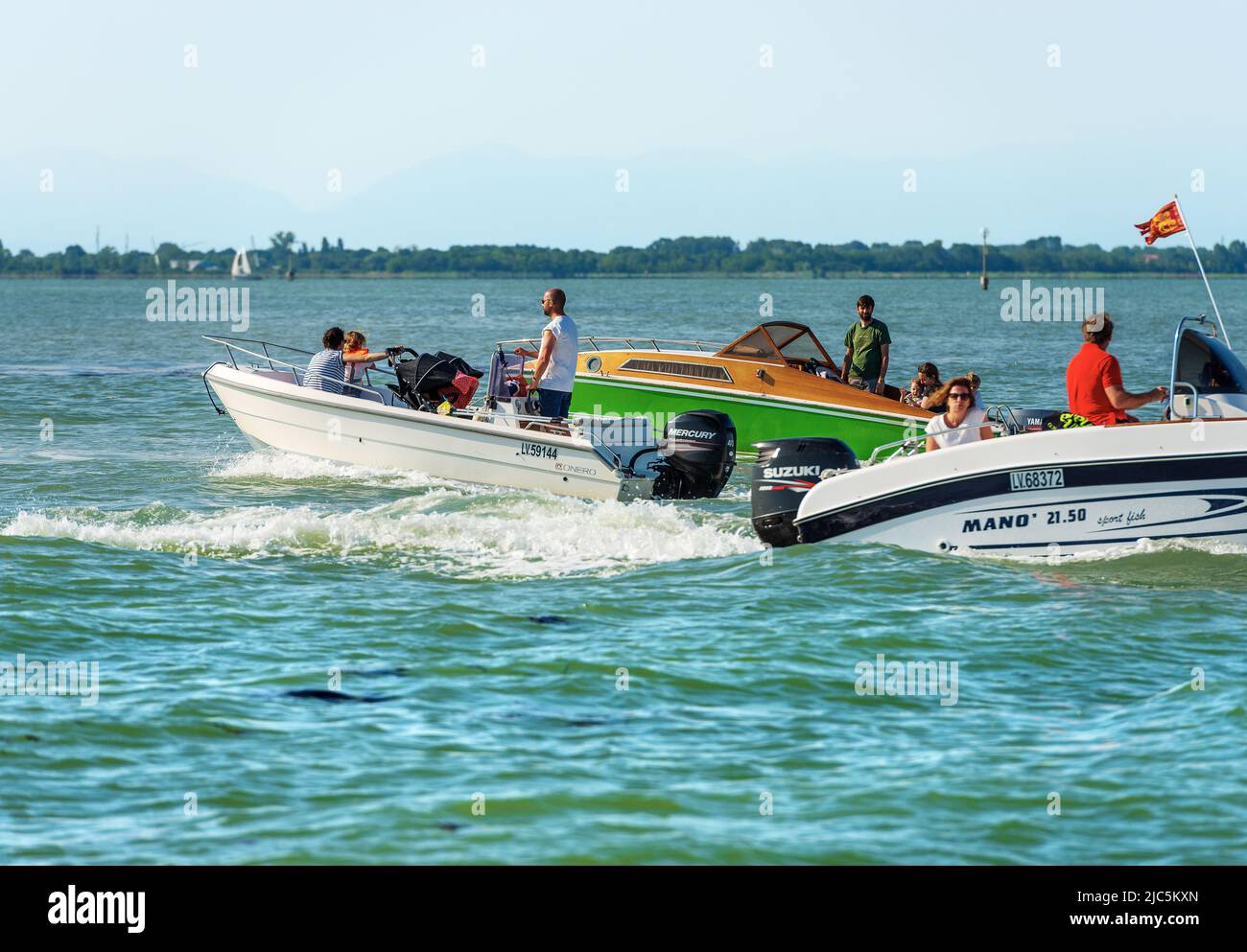 Venice canal motor boat family hi-res stock photography and images - Alamy