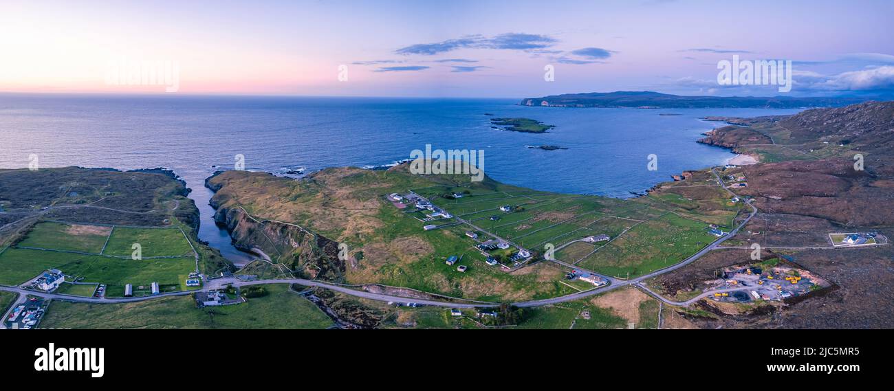 Sunset over Geodha Smoo and Smoo Cave Cliffs from a drone, NC500, North Scotland, UK Stock Photo