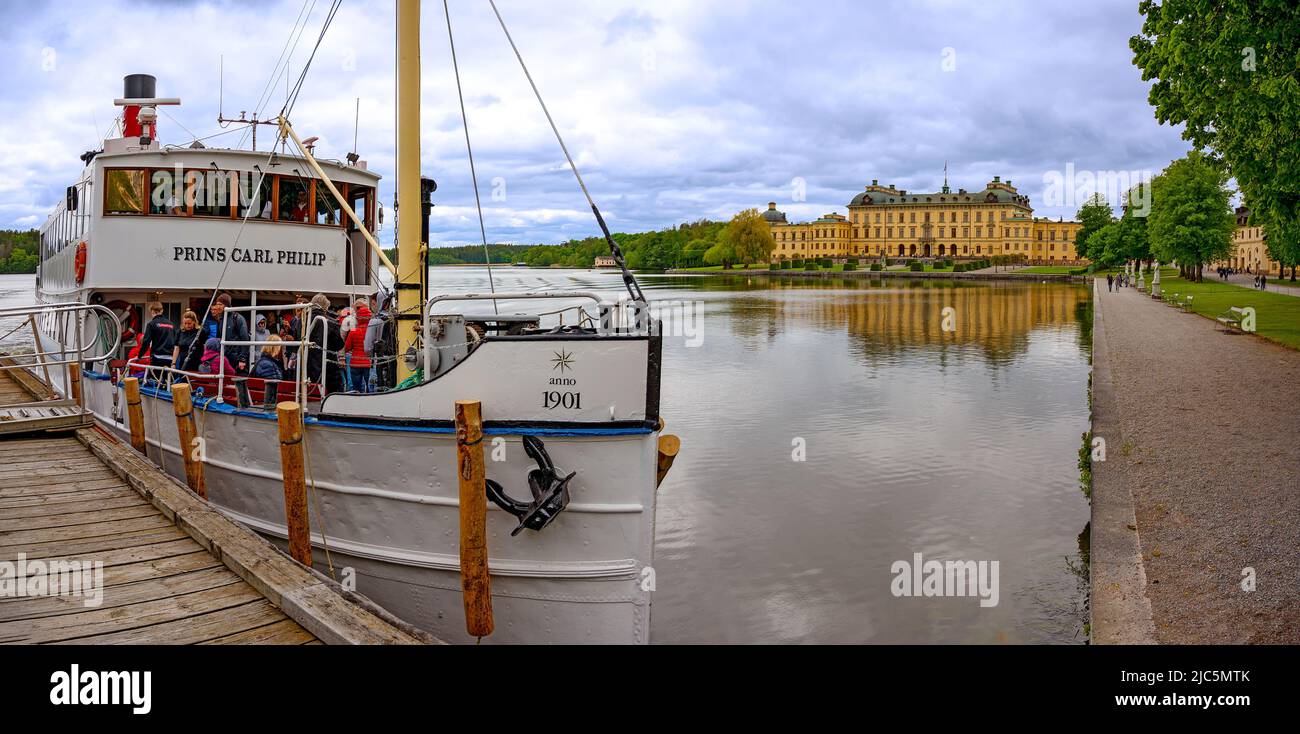 historic motor vessel Prinse Carl Philip from the year 1901 on a jetty before the royal palace Drottningholm near Stockholm, Sweden Stock Photo