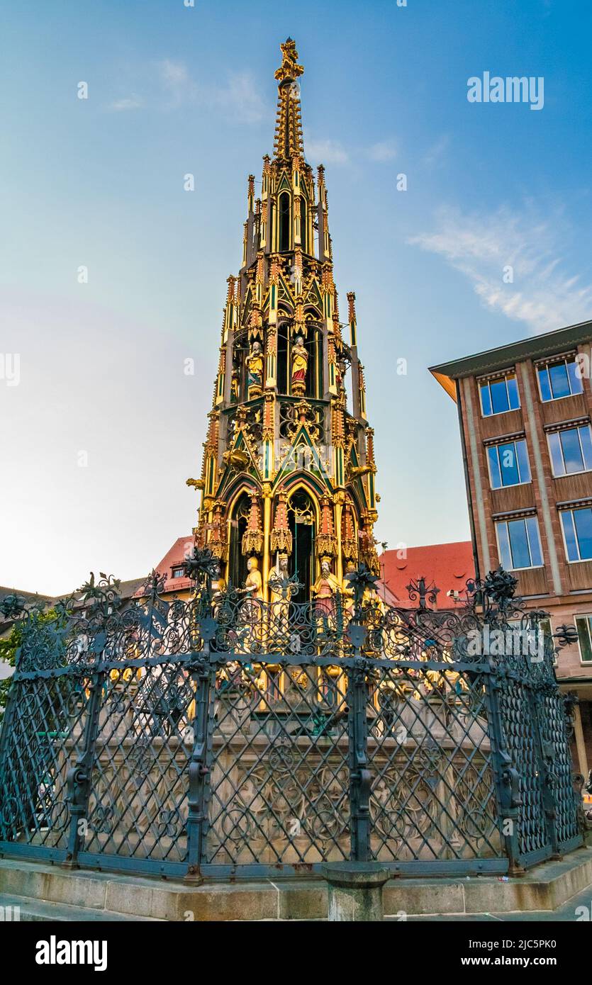 Great close-up view of the Schöner Brunnen (beautiful fountain), a 14th-century fountain in Nuremberg, Germany. The four rows of 40 stone figures... Stock Photo
