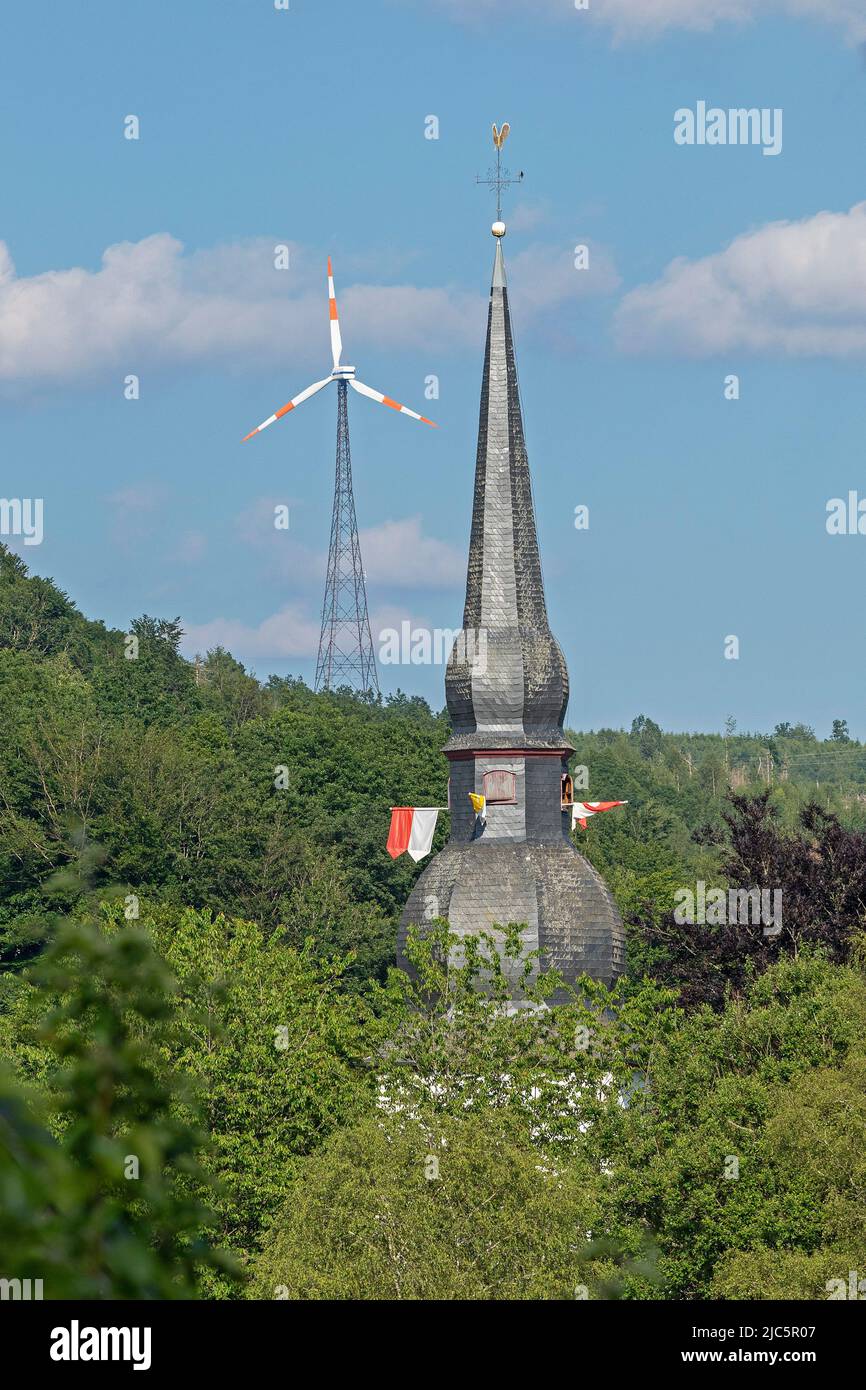 Wind engine, church tower, Neuenkleusheim, Olpe, Sauerland, North Rhine-Westphalia, Germany Stock Photo