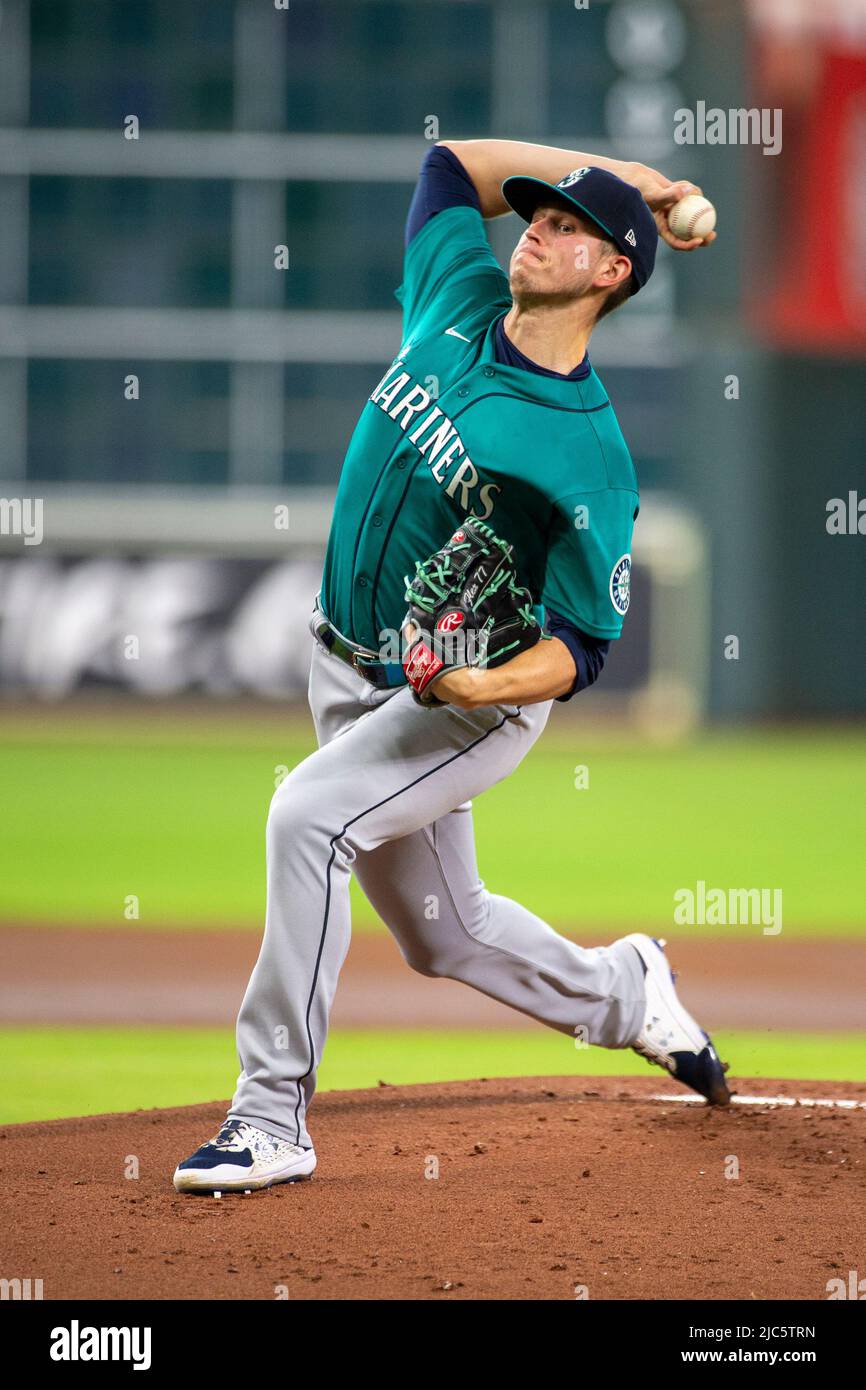 Seattle Mariners starting pitcher Chris Flexen (77) pitches in the bottom of the first inning of the MLB game between the Houston Astros and the Seatt Stock Photo