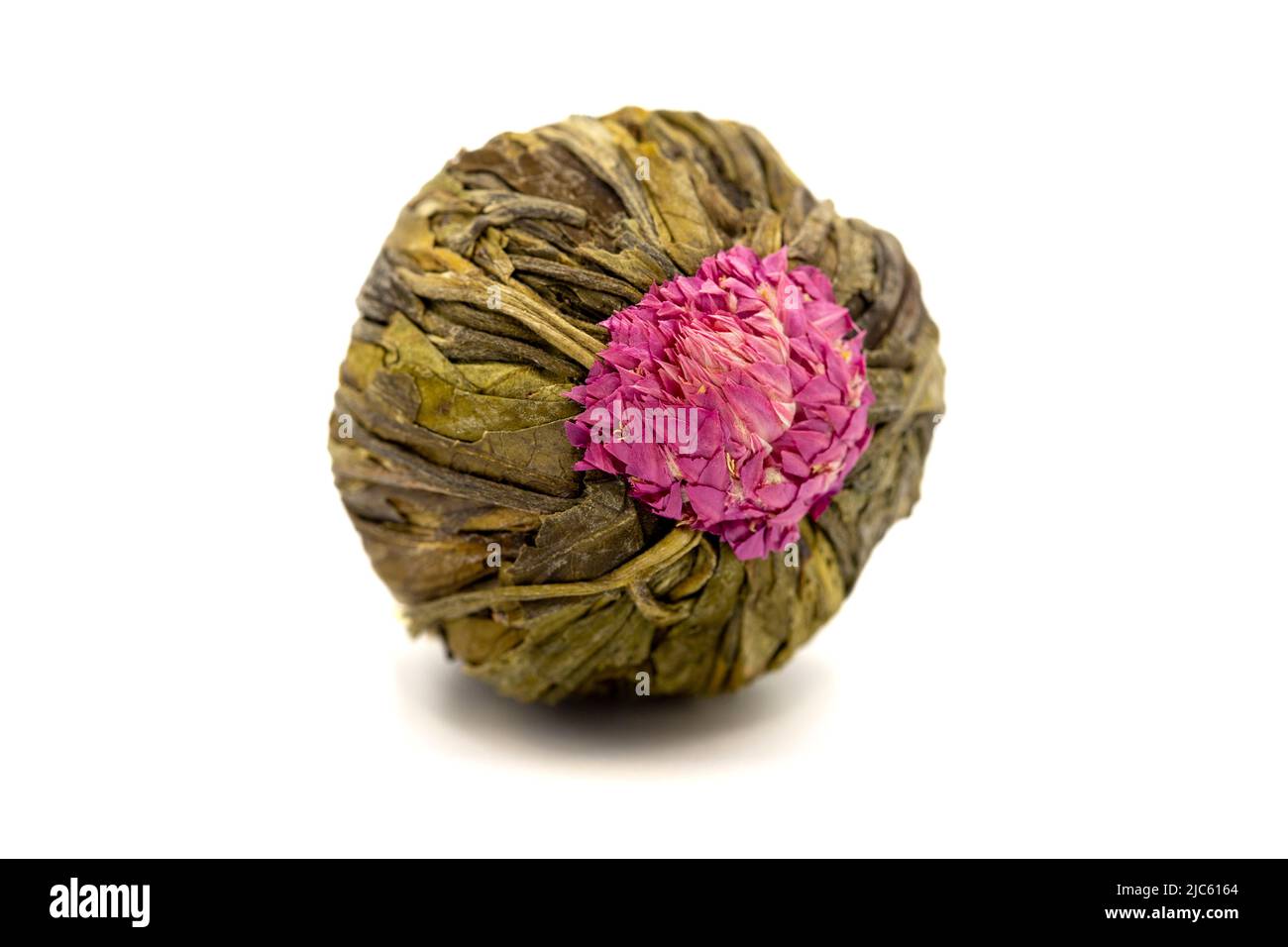 Jasmine tea balls isolated on white background. Flowering tea or