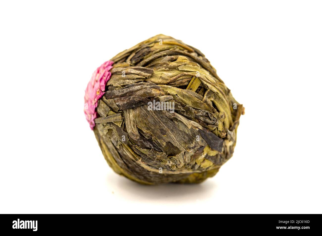 Jasmine tea balls isolated on white background. Flowering tea or