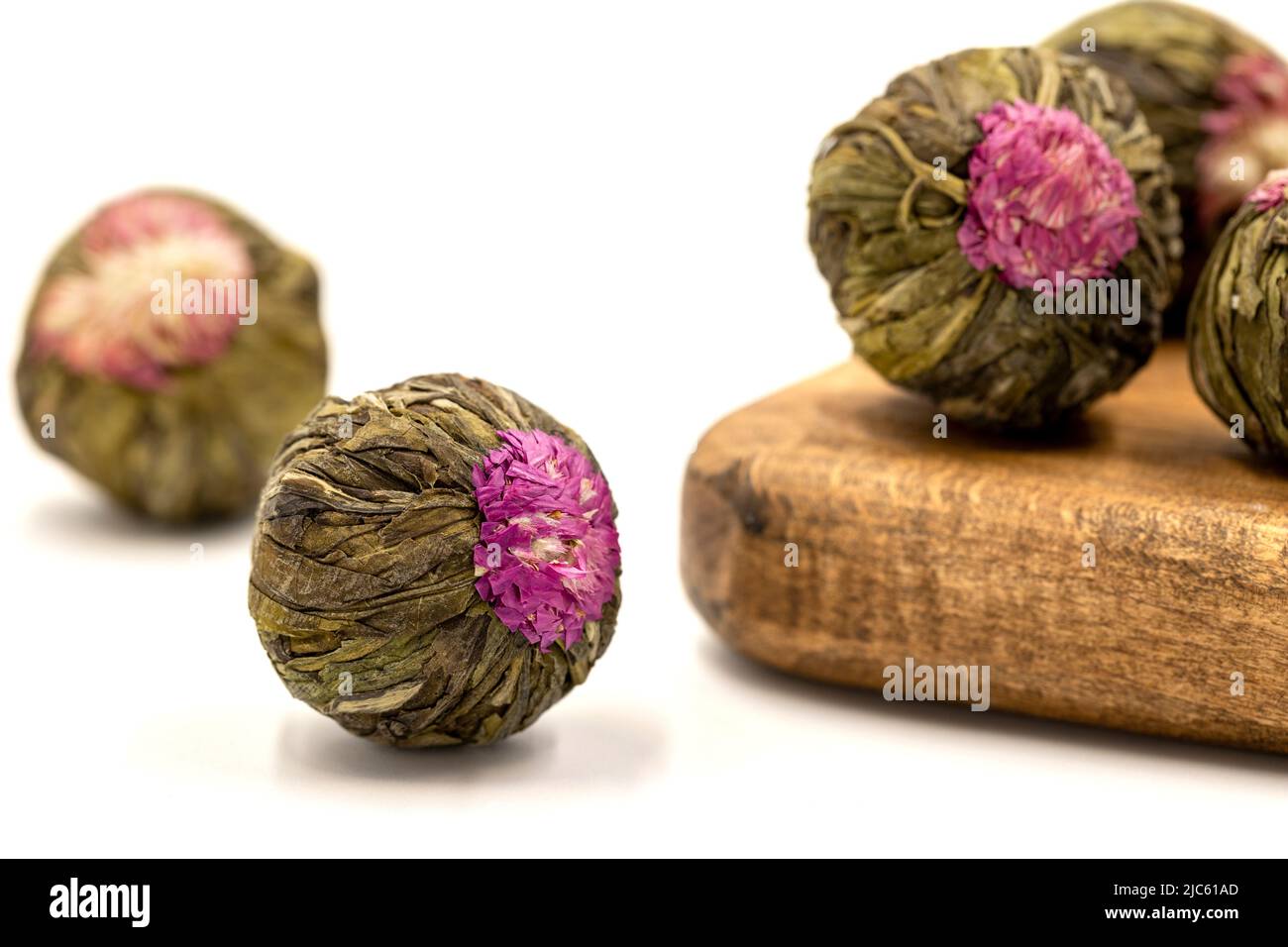 Jasmine tea balls isolated on white background. Flowering tea or