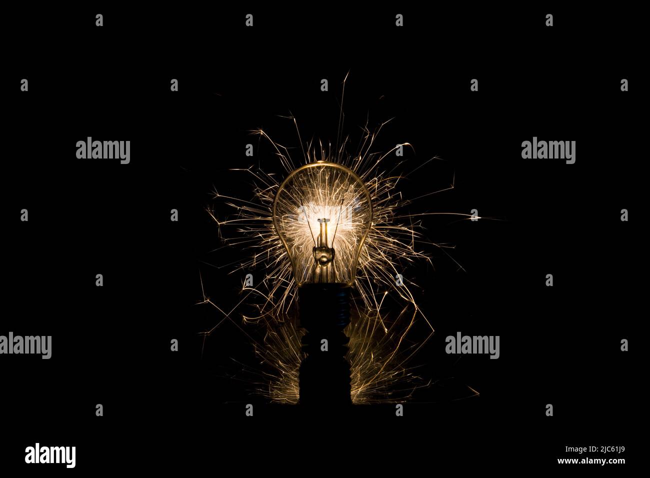 The incandescent lamp burns with sparks Stock Photo Alamy