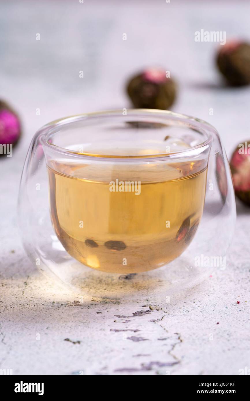 Jasmine tea balls isolated on white background. Flowering tea or
