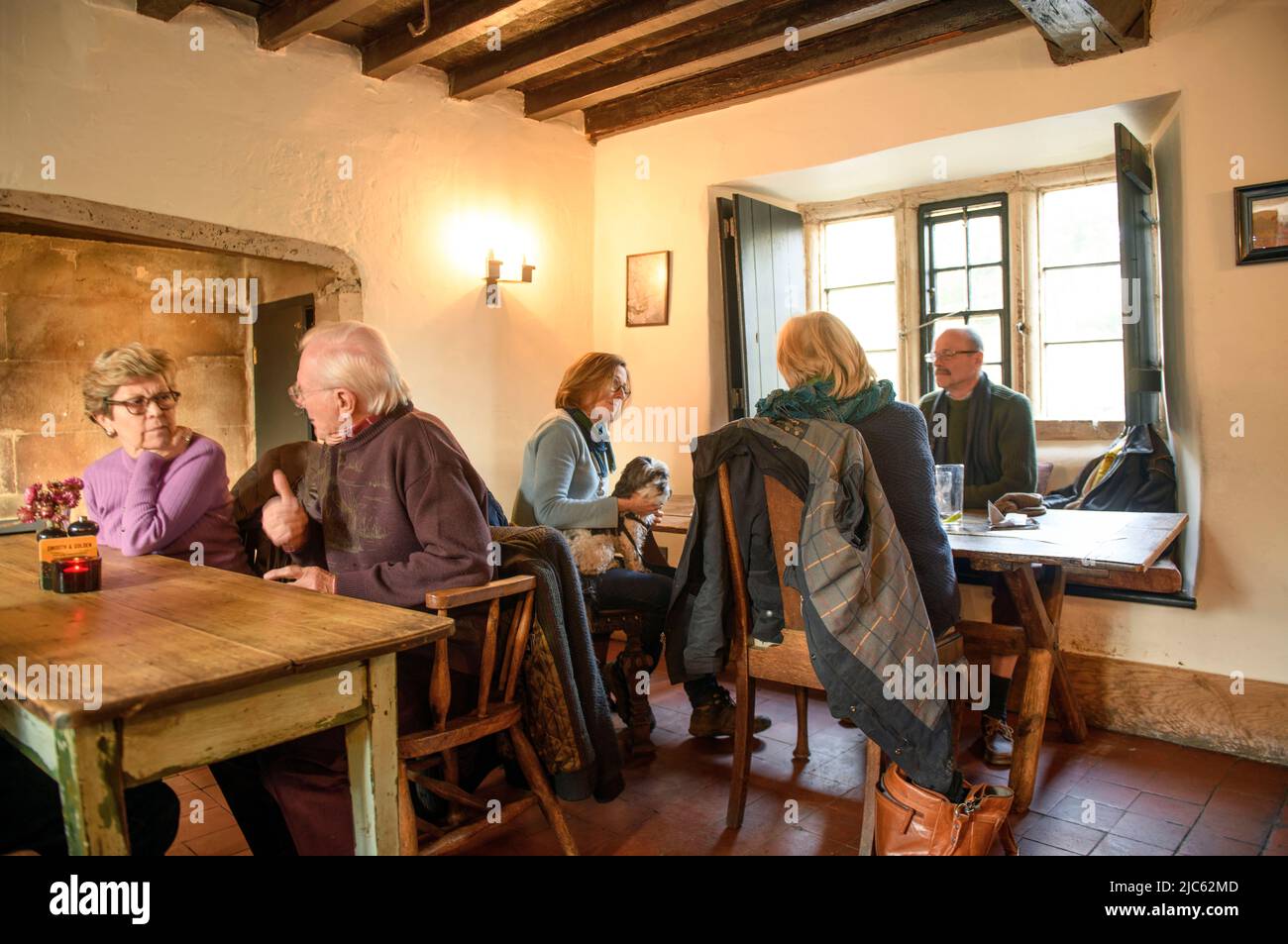 Diners in the tap room at the Packhorse community pub South Stoke, Somerset UK Stock Photo