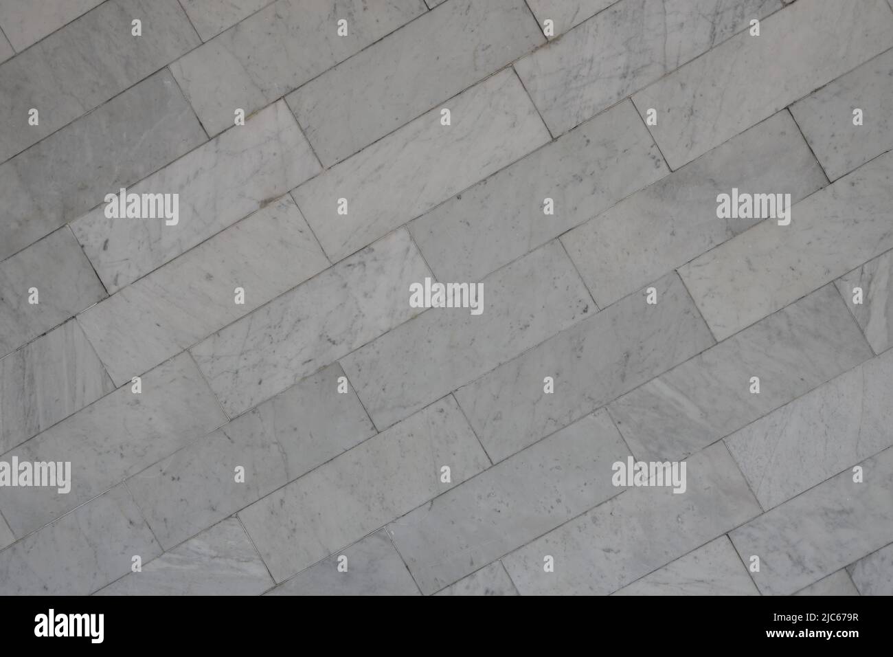 Rectangle marble tile with natural pattern. White and grey marble mosaic wall tile texture