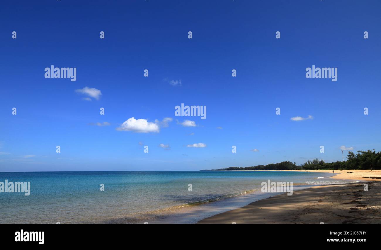 beautiful white clouds, blue sky, sea and beach. scenery of thai sea. Stock Photo