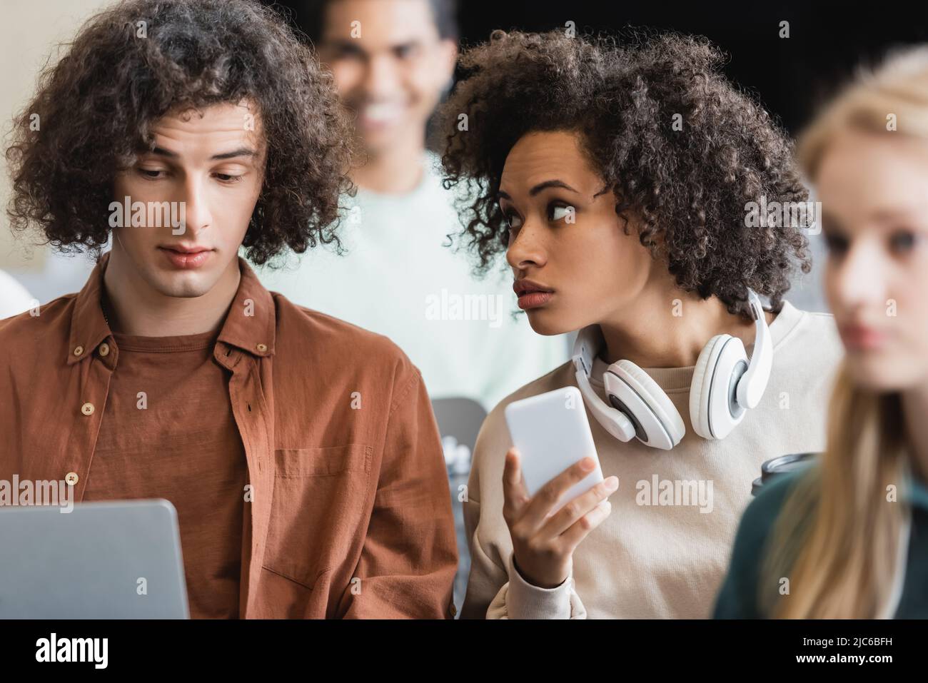 Man woman classroom talking hi-res stock photography and images - Alamy