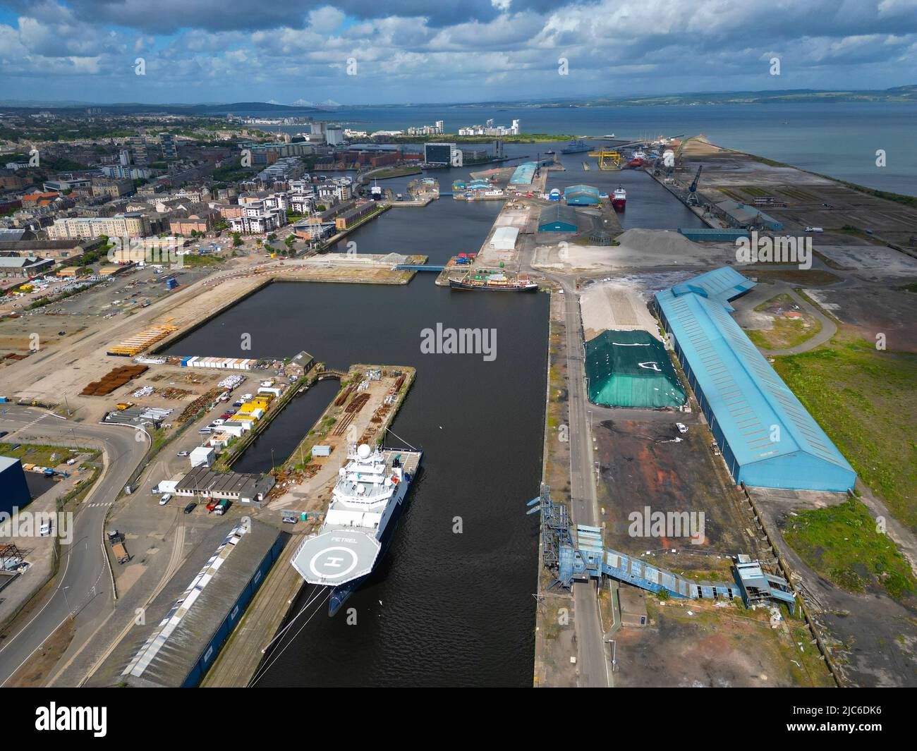 Leith, Scotland, UK. 10 June 2022. Aerial general view of Fort Ports site on the Firth of Forth at Leith. Forth Ports are one of the candidates bidding to become one of Scotland’s first two green Freeports. The successful Freeports are expected to generate billions of pounds of investment and create thousands of jobs.  Iain Masterton/Alamy Live News Stock Photo