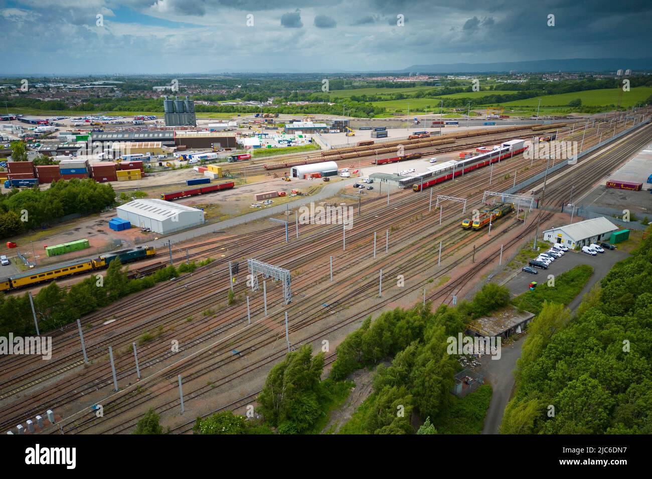 Bellshill, Scotland, UK. 10 June 2022. Aerial general view of  Mossend International Rail freight Park in Bellshill, North Lanarkshire. Mossend ( including Glasgow Airport and Clydeport) is part of the Clyde Green Freeport bid to become Scotland’s first two Green Freeports. The successful Freeports are expected to generate billions of pounds of investment and create thousands of jobs.  Iain Masterton/Alamy Live News Stock Photo