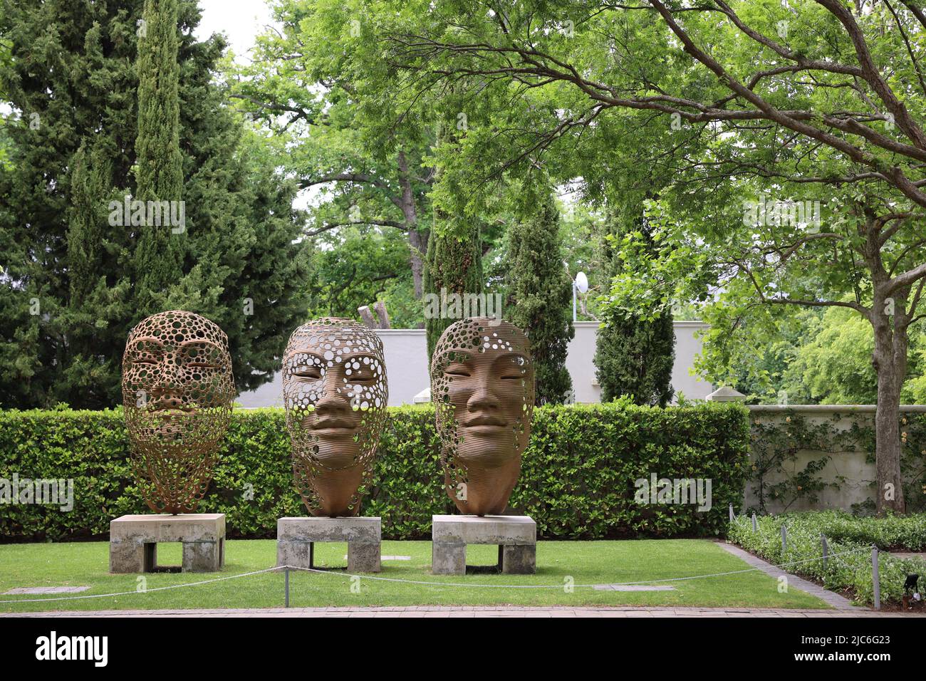 Sculptures in the garden of Cape Town, green trees, park, South Africa Stock Photo